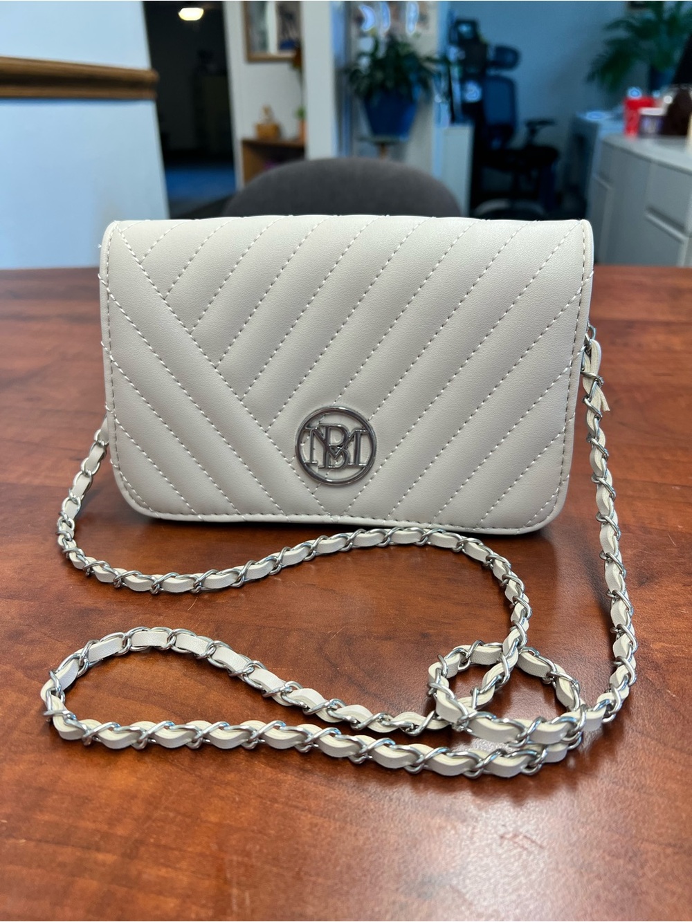 Badgley Mischka Quilted tan Crossbody with Silver Chain Accent like new